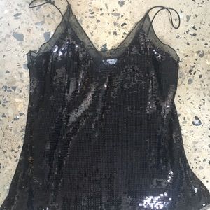 Free people black tank top. Size medium never worn